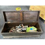 An antique pine tool box containing joiner's tools