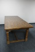 A good quality mixed wood mosaic dining table on refectory style base CONDITION REPORT: