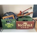 Two plastic Tuborg beer crates together with a wooden Koral beer crate,