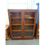 An Edwardian oak bookcase , width 99 cm.