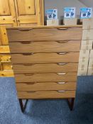 A mid century Europa furniture teak six drawer chest on raised legs