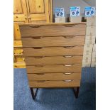 A mid century Europa furniture teak six drawer chest on raised legs