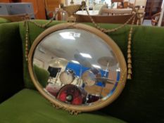 An antique gilt framed mirror
