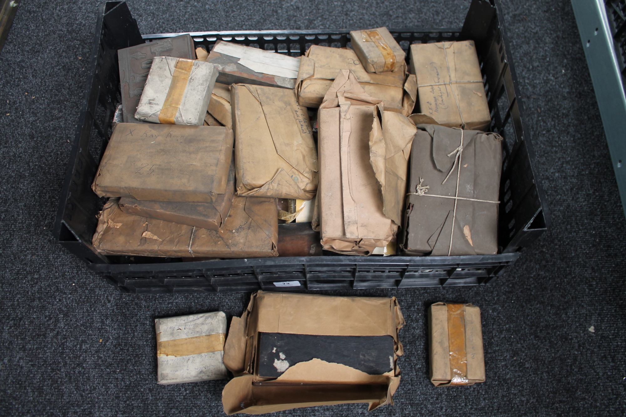 A crate of antique printing blocks relating to Newcastle upon Tyne