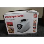 A boxed Morphy Richards bread maker