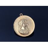 A Charles II yellow metal medallion Charles and Catherine Colonization medal 1670