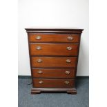 A Stag five drawer chest