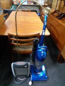 A Dyson DC24 upright ball vacuum