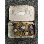 A tin of a collection of British Legion medals