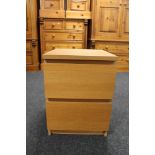 An Ikea oak effect two drawer chest