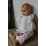 A vintage plastic doll