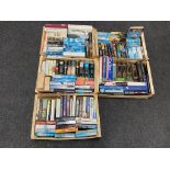 Five crates of hardback and paperback books,