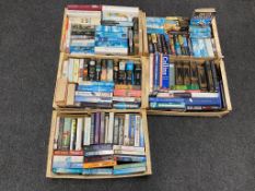 Five crates of hardback and paperback books,