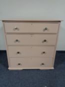 A painted pine four drawer chest