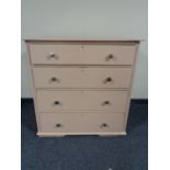 A painted pine four drawer chest