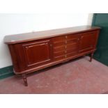 A twentieth century mahogany double door sideboard fitted with five drawers