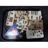 A tray of vintage enamelled badges, railways etc AEG plaque.