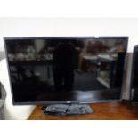 A JVC 40" LED TV with remote (continental wiring)