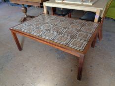 A mid century Danish teak tiled coffee table