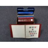 A box of stamp albums, coronation stamps,