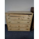 A nineteenth century pine five drawer chest