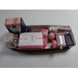 A box of lady's beauty products and gift sets,