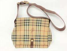 A Burberry Check Leather handbag, with brown shoulder strap and press-stud flap,