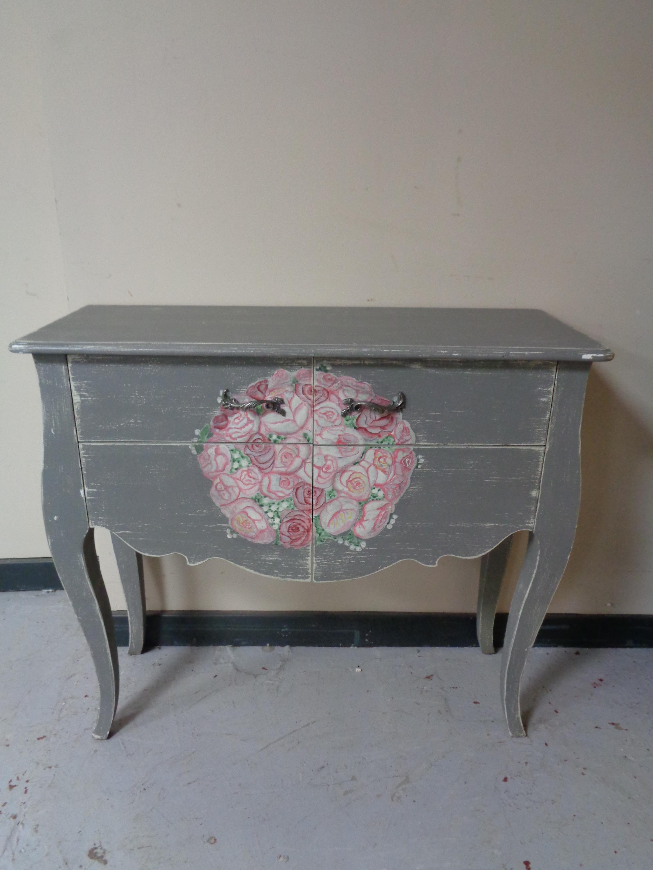 A painted French style double door cabinet