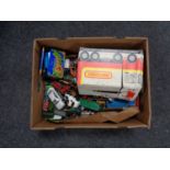 A box of play worn die cast vehicles