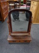 An antique mahogany toilet mirror fitted with two drawers