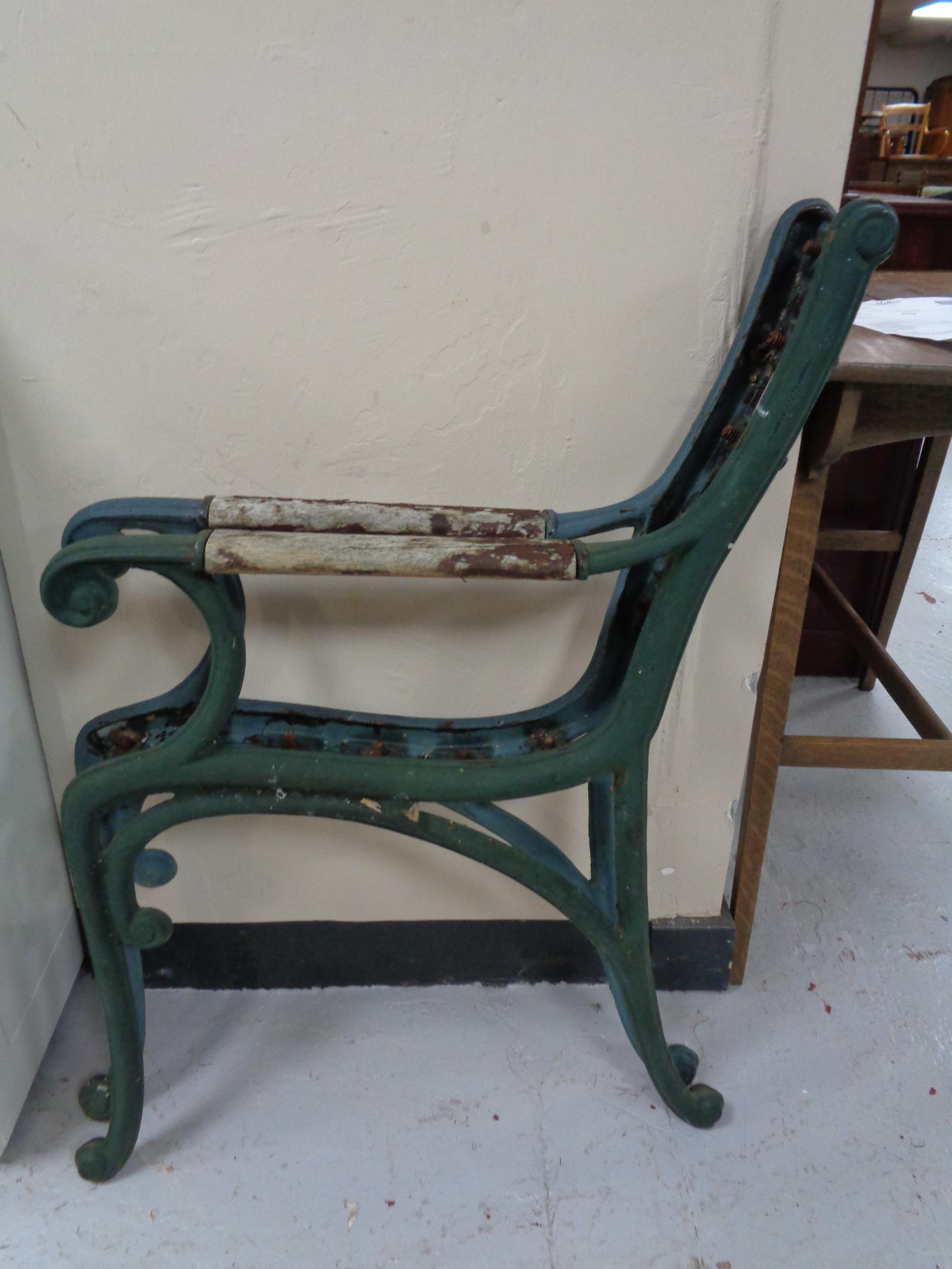 A set of cast iron bench ends