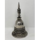 A south-east Asian silvered metal stupa, height 18.