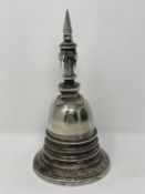 A south-east Asian silvered metal stupa, height 18.