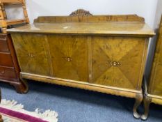 A mid century triple door sideboard