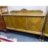 A mid century triple door sideboard