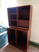 Two sets of mahogany effect bookshelves