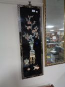 An oriental lacquered wall panel