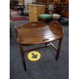 A mahogany butler's tray on stand