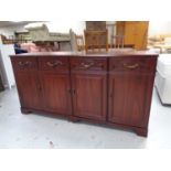 A reproduction mahogany sideboard