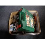 A box of Black and Decker multi saw, bottle jack, hand tools,