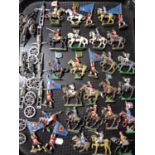 A tray of early twentieth century hand painted lead figures, military figures on horseback,