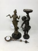 A French spelter figural clock and another figure of a torch bearer