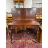 A Victorian mahogany tea table