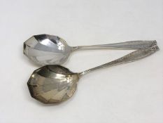 A pair of silver spoons,