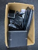 A box of assorted electricals, sub woofer with surround, keyboard,