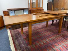 A reproduction extending dining table