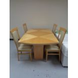A high gloss reproduction dining table and four chairs
