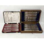A cased set of six silver handled knives by Viners,