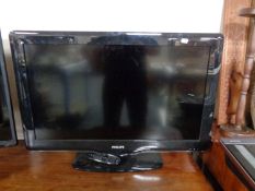 A Philips 32" LCD TV with remote (continental wiring)