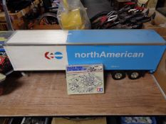 A North American trailer car together with a boxed Tamiya tractor truck electrical unit set